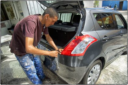 Wendall training in car mechanics.