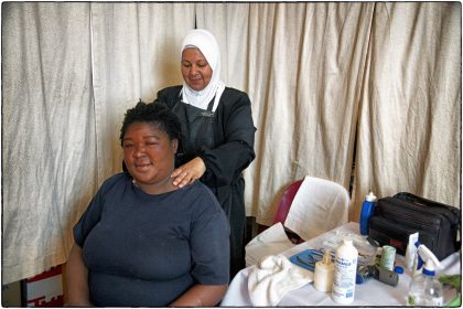 Christeline having a back massage from volunteer. 