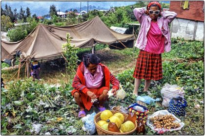 Traders selling honey and fruit,Philippines - Gerry Atkinson