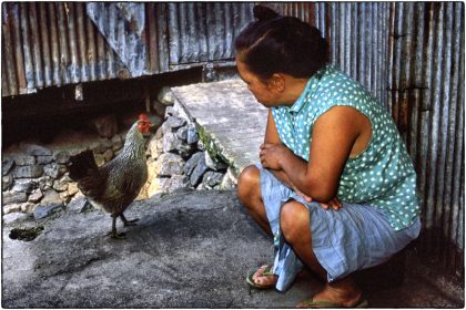 Woman with hen, Philippines - Gerry Atkinson