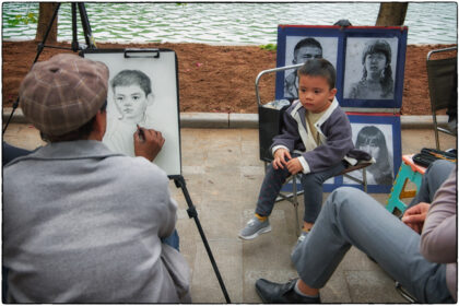 Portrait Artist at Hoan Kiem Lake -Hanoi.